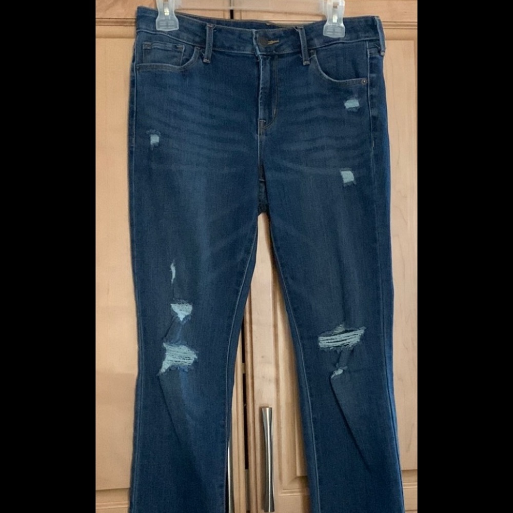 Mid Rise distressed power slim straight leg size 6